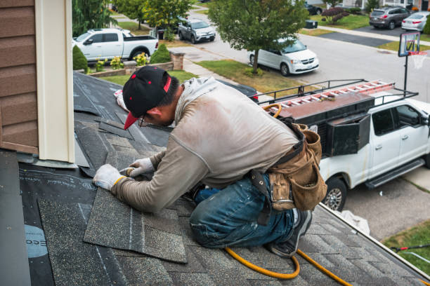 Professional Gutter Installation technician working in Patchogue, NY